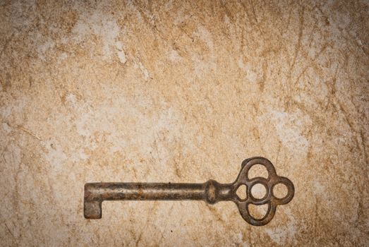 Rusty keys on old paper background with blended layers