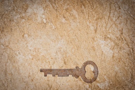 Rusty keys on old paper background with blended layers