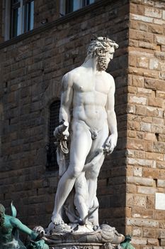 Florence - Sculpture Hercules and Cacus by Bandinelli. The white marble sculpture Hercules and Cacus is to the right of the entrance of the Palazzo Vecchio in the Piazza della Signoria