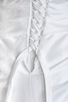 Close up of a white Wedding Dress with Lace