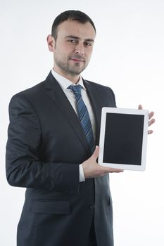 Businessman shows tablet