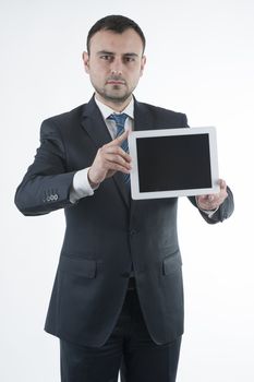 Businessman shows tablet