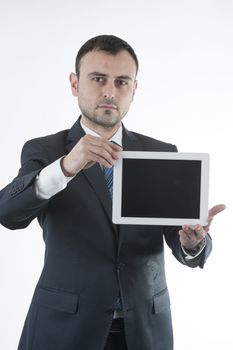 Businessman shows tablet