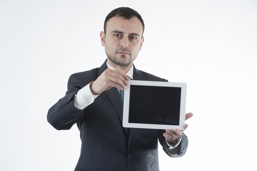 Businessman shows tablet