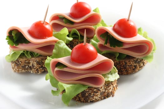canape with boiled sausage