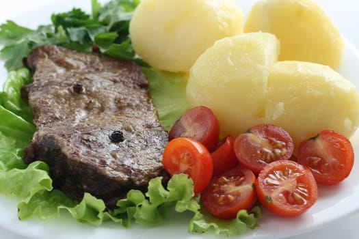 fried beef with boiled potato