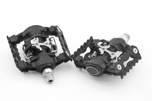 Bicycle pedals isolated against a white background.