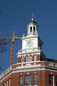 A clock tower in Portland Oregon under repair