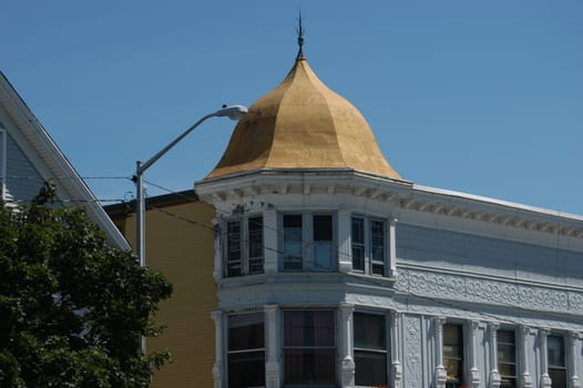 An old New England building with a copper top