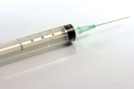 syringe and needle closeup medical concepts 