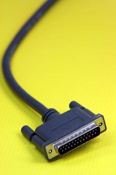 computer connection cable in yellow background