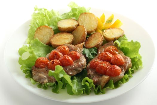 fried pork with tomato and potato