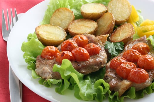 fried pork with tomato and potato