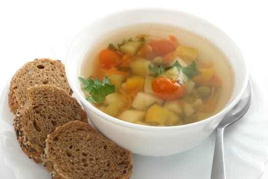 vegetable soup in white bowl