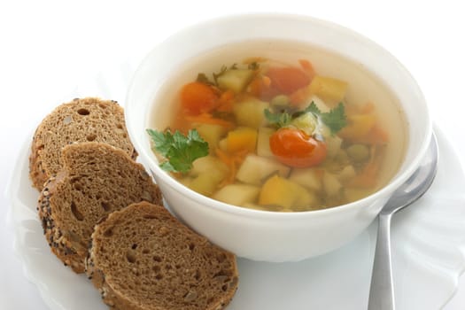 vegetable soup in white bowl