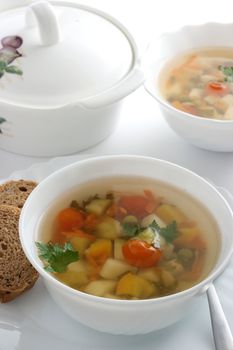 vegetable soup in white bowl