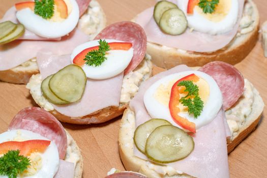 Detail of homemade sandwich with egg and sausage