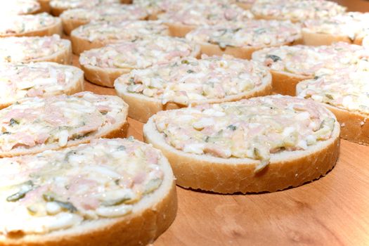 Detail of homemade sandwich with egg and sausage