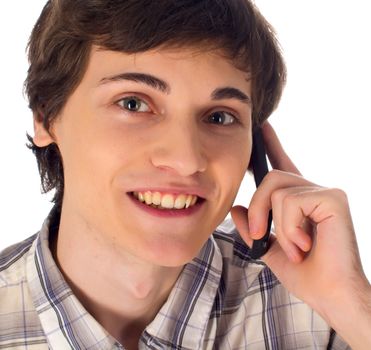 Young man having phone conversation on white background