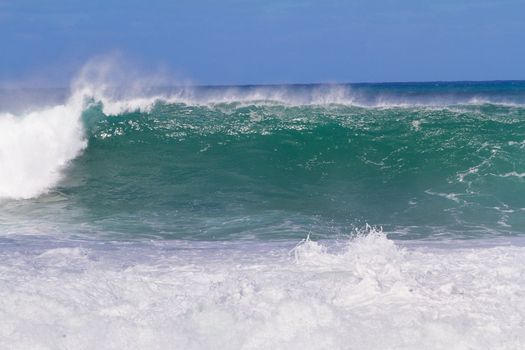 The dream of every surfer to find waves like this. These waves are at pipeline on the north shore of Oahu during the winter in a huge storm.