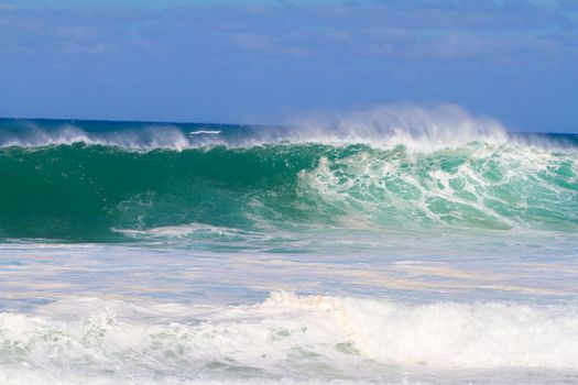 The dream of every surfer to find waves like this. These waves are at pipeline on the north shore of Oahu during the winter in a huge storm.