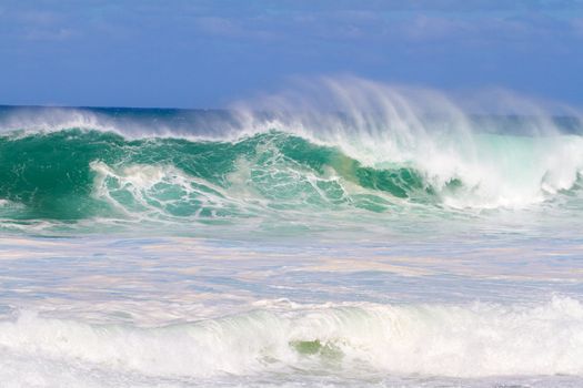 The dream of every surfer to find waves like this. These waves are at pipeline on the north shore of Oahu during the winter in a huge storm.