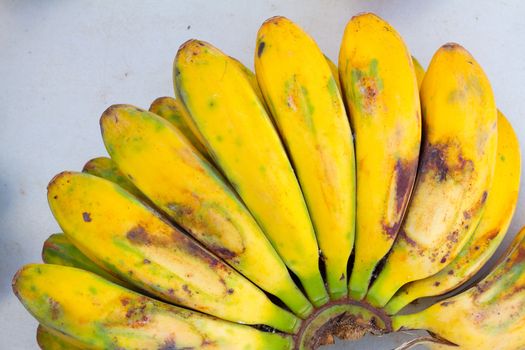 Images from a farmers market in Hawaii showing tropical fruits or vegetables in simple photos with vibrant colors.