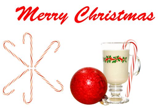 A cold glass of eggnog on white with a peppermint candy cane in it, more candy canes on the side and a Christmas Ball with room for your text.