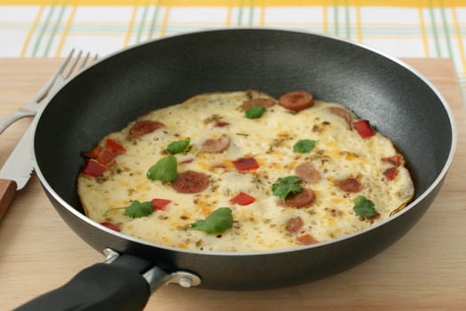 omelet with sausages