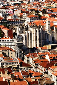 Bird view of central Lisbon with colorful houses and orange roofs