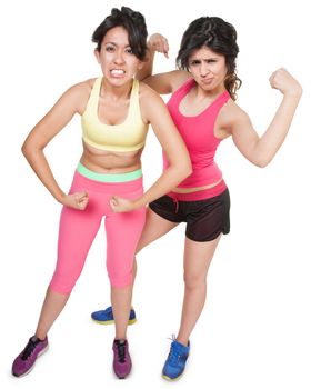 Cute Latina sisters flexing muscles over white background