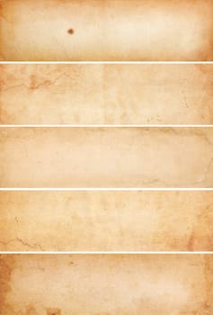 Collection of five heavily aged and water stained blank paper banners.  Isolated on white.