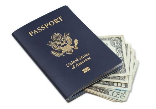 Passport of United States of America and Dollar bills isolated
