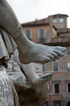 Roma - Piazza Navona square, Italy. Detail of the Fountain of the Four Rivers, showing of the river-god Ganges.