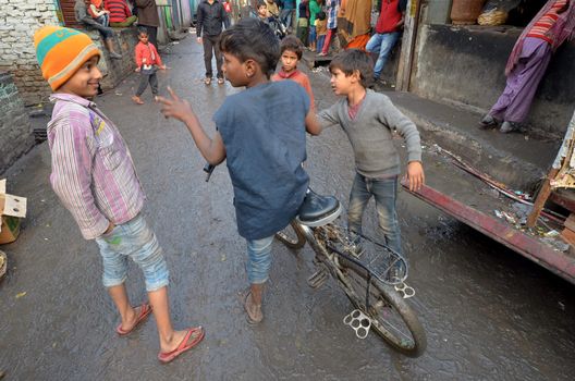 New Delhi,India-February 4, 2013: a  unidentified children playing in the poorest district of New Delhi in February 4,2013 New Delhi dramatically increases the number of poor people living in slums