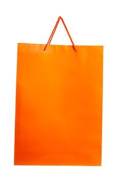 Orange paper bag isolated on white. Front angle.