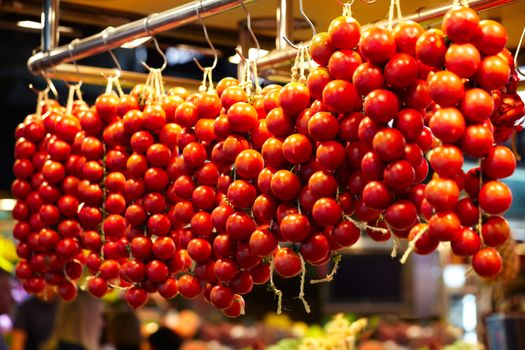 Tomatoes at a stand in the Boqueria Market, in Barcelona, Spain.