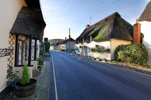 Traditional picturesque thatched buildings in the rural village of lulworth