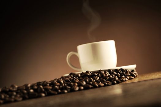 cup of coffee on the wooden table