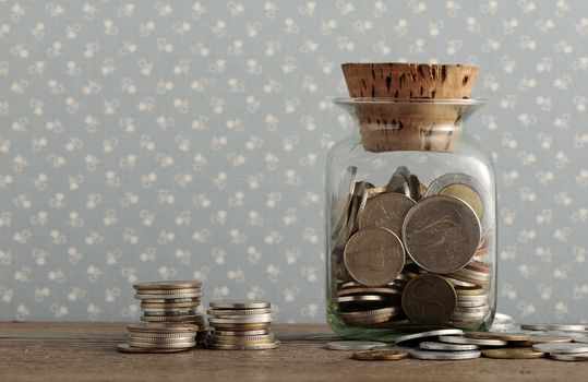 old coins on the wooden table