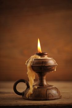 old candle on a wooden table