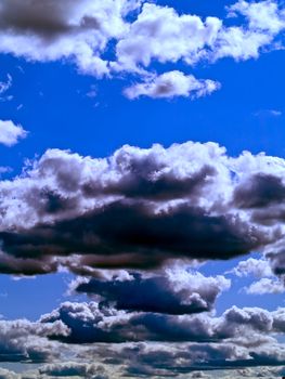 Gray and white clouds on a blue sky
