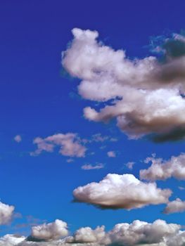 Gray and white clouds on a blue sky