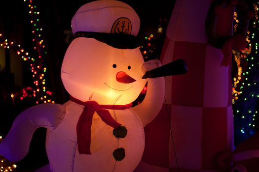 illuminated inflatable snow man with x-mas lights