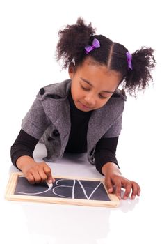 young African girl with a black slate