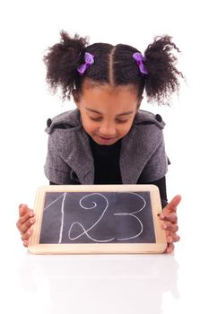 Student little girl with beautiful hairstyle isolated over white