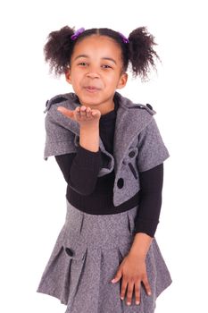 young African girl sticking tongue out, isolated on white background