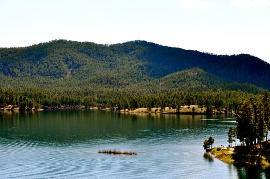 Black hills and water background