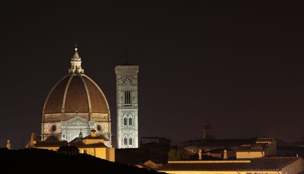 The skyline of Florence, Italy at night.  Featuring the Duomo and Giotto's Bell tower.