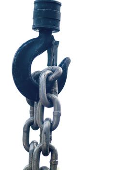 Large metal hook and chains attached to a pulley